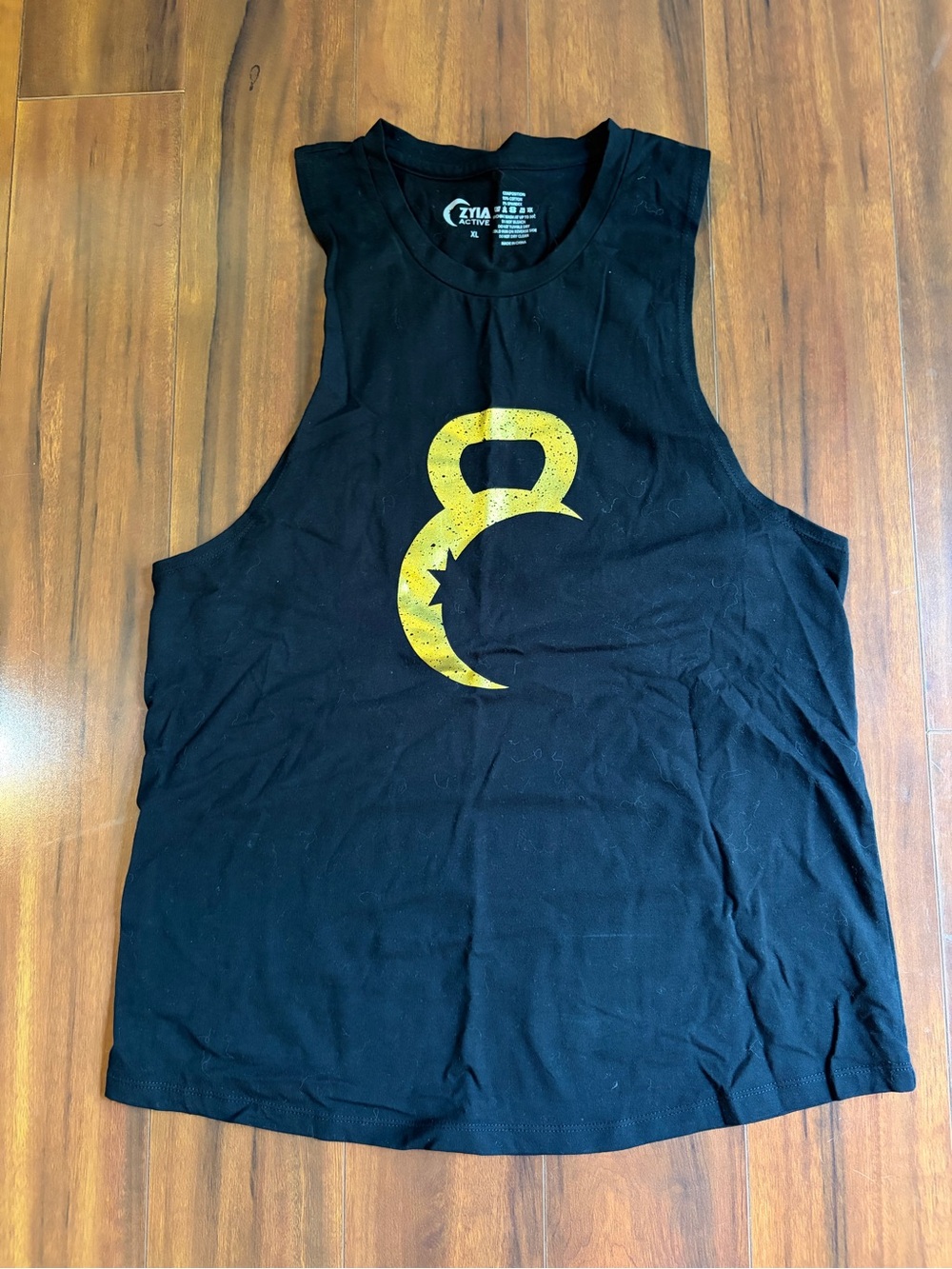 ZYIA Black Women’s Active Tank with Yellow Kettlebell Graphic
